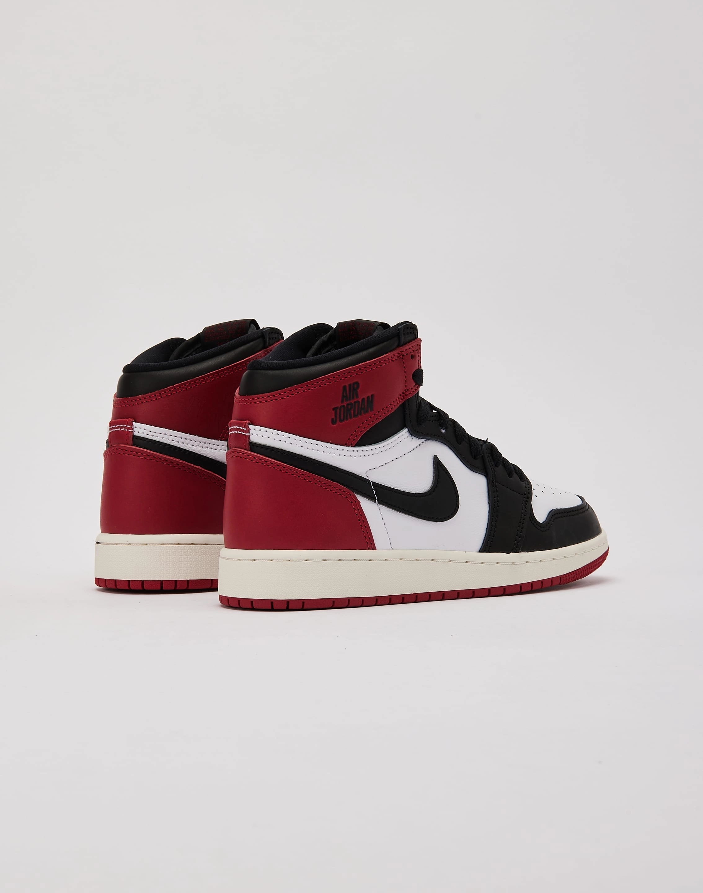 Multidirectional Tread Jordan Air Jordan 1 Retro High OG 'Black Toe Reimagined' Grade-School