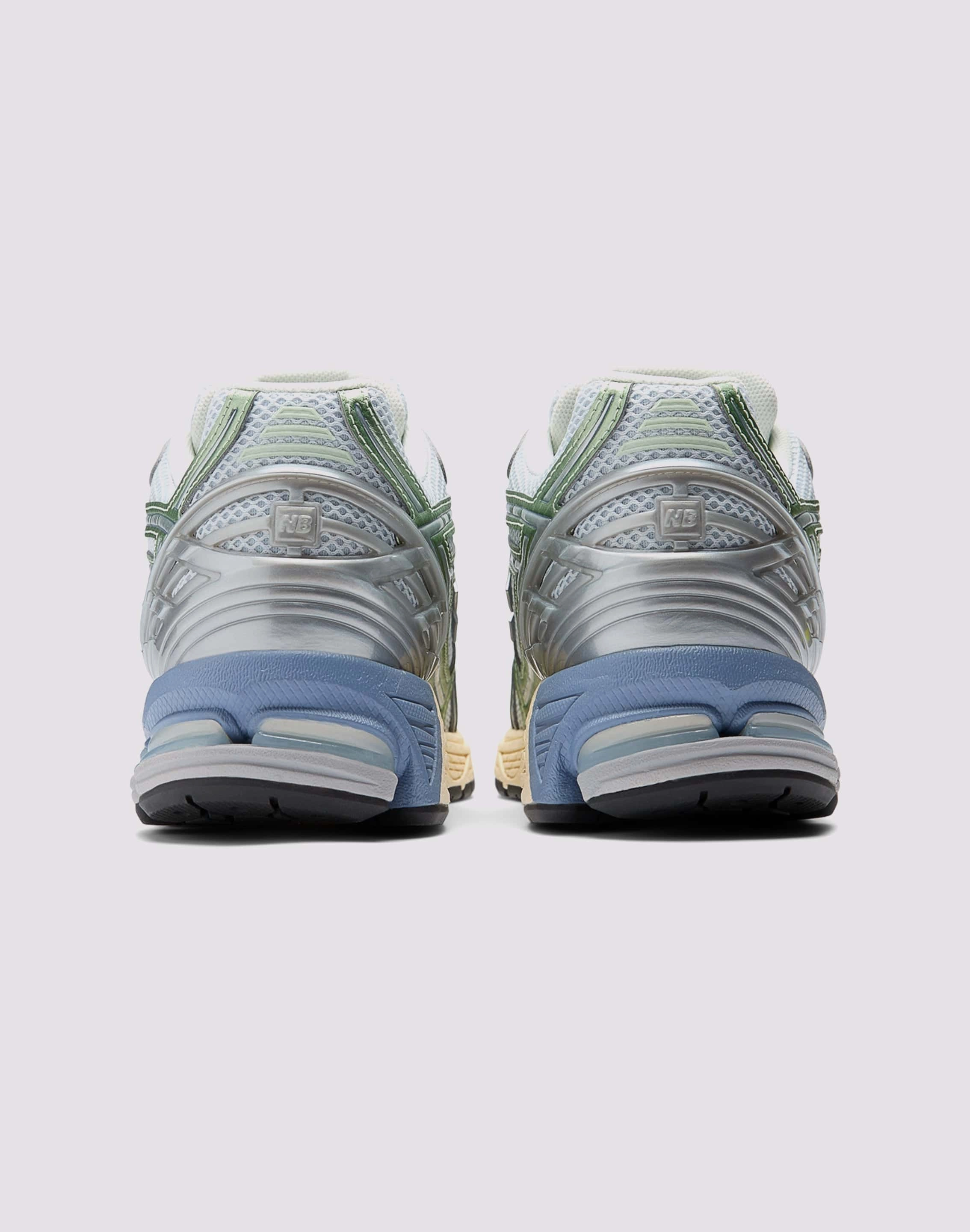 sprint training running in a city park shoes New Balance 1906R