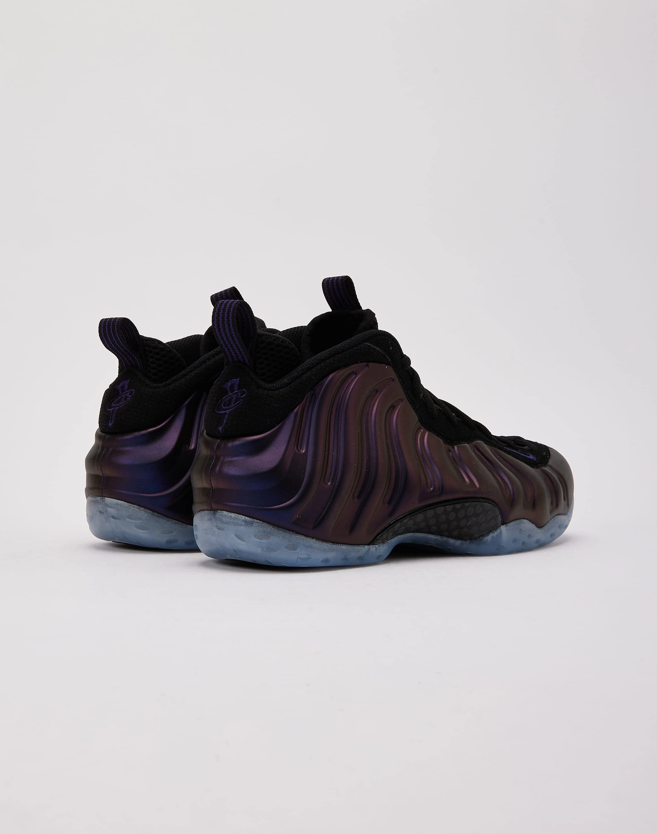 Minimalist anti - static Nike Air Foamposite One 'Black and Varsity Purple'