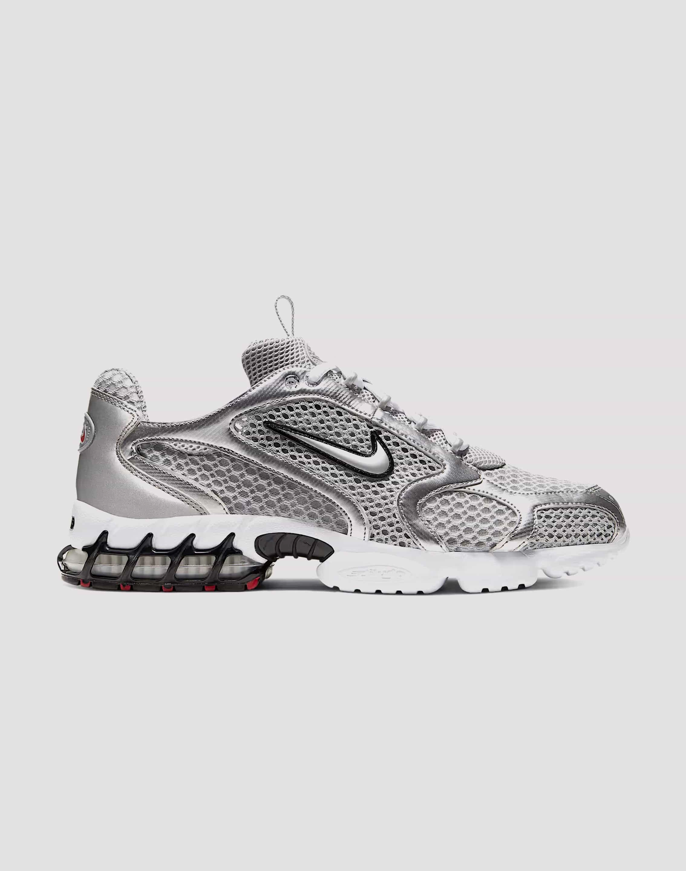 Nike Air Zoom Spiridon Cage 2 running in a tennis court area shoes